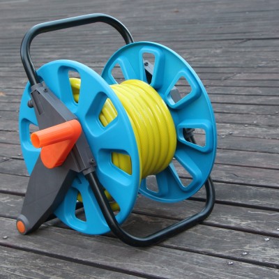 Mini retractable self retracting garden hose reel